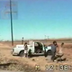 Illustration for article titled VIDEO: Man Tackles Emu In Roadside Wrestling Match
